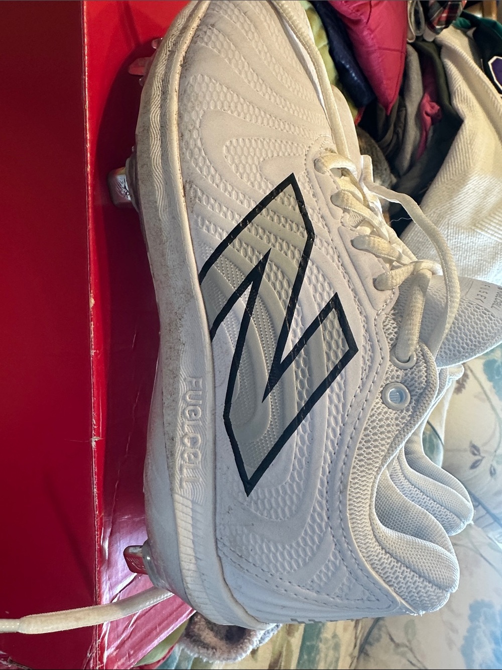 New Balance White Athletic Cleated Shoe with Black Logo